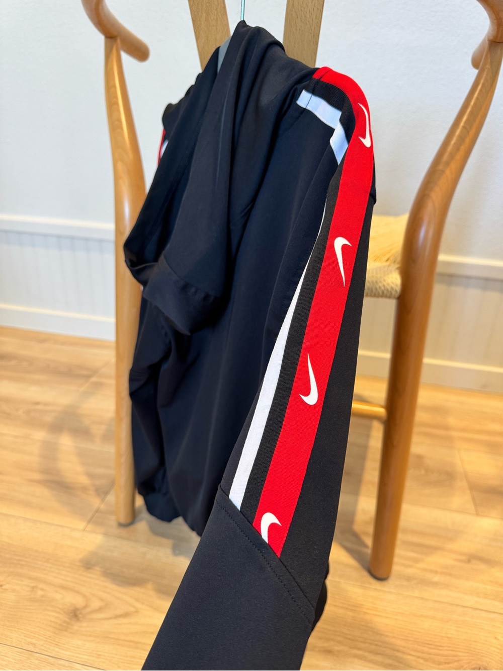 Nike Youth Black Jacket with Red & White Swoosh Stripe